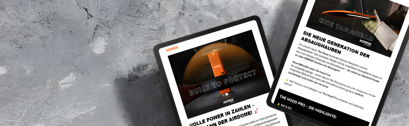 Zwei Tablets zeigen den KEMPER Newsletter mit Informationen zu Luftreinigung und Absaugtechnik
