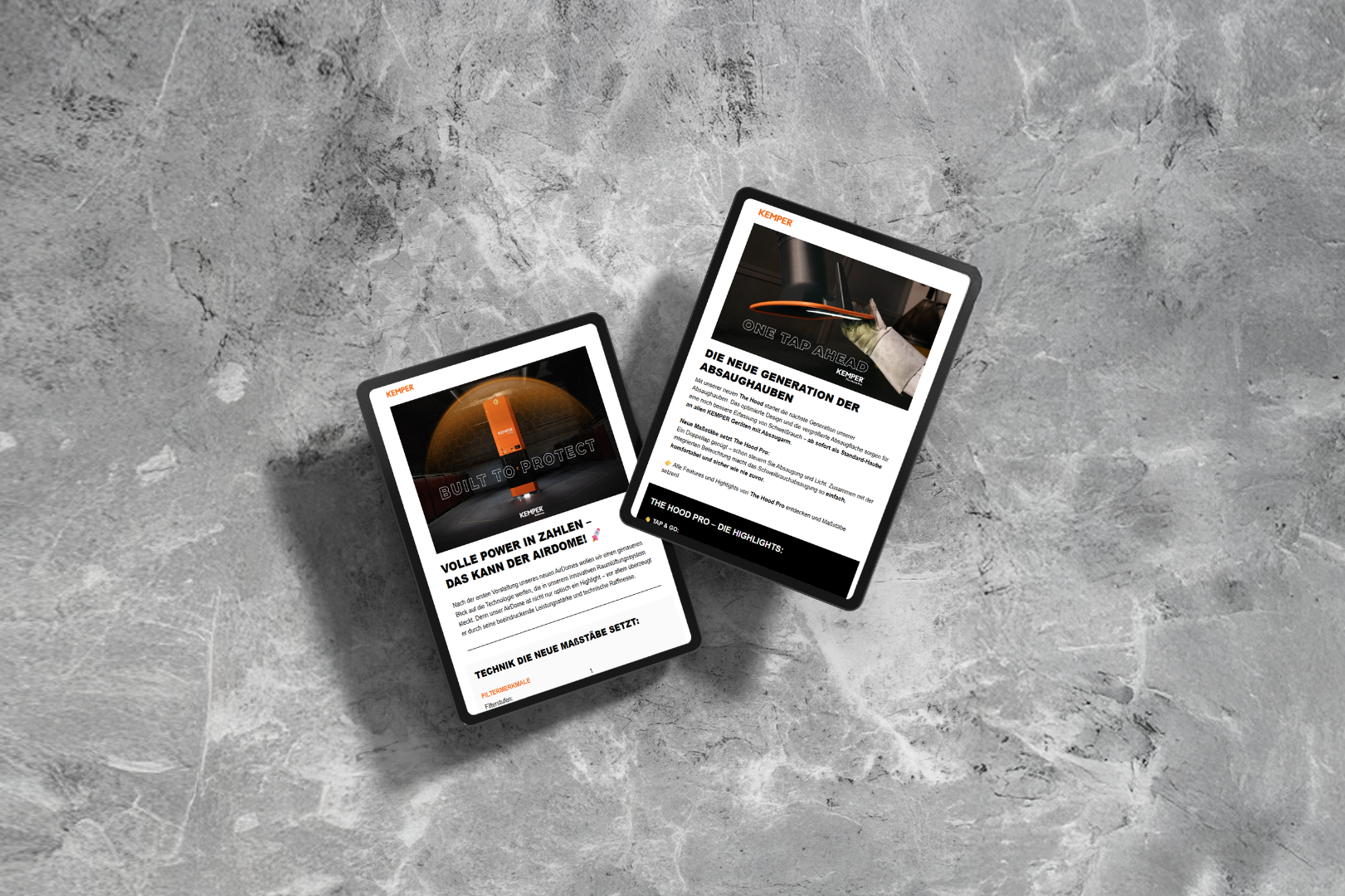 Zwei Tablets zeigen den KEMPER Newsletter mit Informationen zu Luftreinigung und Absaugtechnik